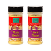 Two plastic bottles of fat-free Movie Theater flavored popcorn seasoning with black lids and red and purple labels, made in USA, ideal for Kitchen & Food and Popcorn collections.