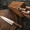 Set of kitchen knives with solid walnut handles stored in a wooden block, featuring sharp stainless steel blades, ideal for food prep in Kitchen & Food and USA Made collections.