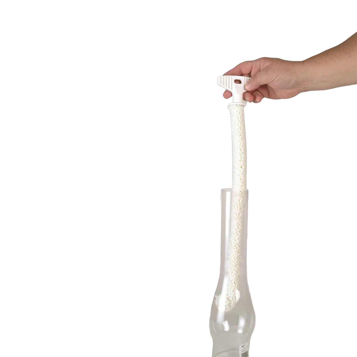 Hand holding a flexible white foam brush with a textured surface inserted into a glass chimney, designed for thorough cleaning, USA made and ideal for lamps and lighting maintenance.