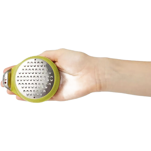Handheld PalmZester citrus tool with ergonomic green silicone grip and stainless steel grating surface, ideal for Kitchen & Food, Kitchen Gadgets, Cooking and Baking Helpers, Best Sellers, and Promo Eligible collections.