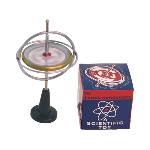 Metal gyroscope with spinning disc mounted on a black plastic stand next to a colorful vintage-style box, featuring classic scientific toy design, part of USA Made and Toys, Books & Games collections.