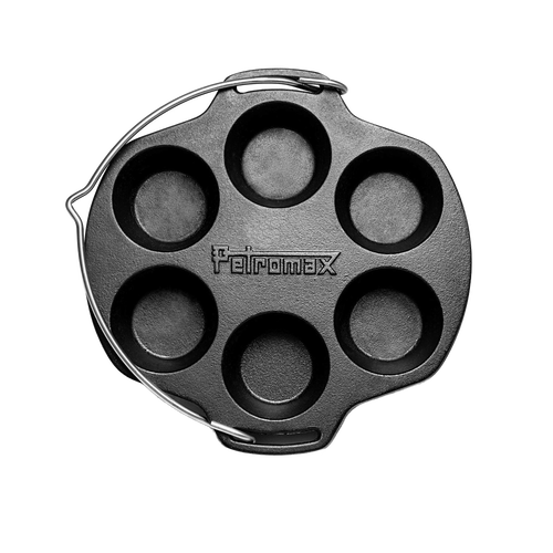 Round cast iron muffin pan with six cups and integrated handle, crafted for reliable outdoor and indoor cooking, suited for Farm, Garden & Tool, Camping, Kitchen & Food, and Cookware collections.