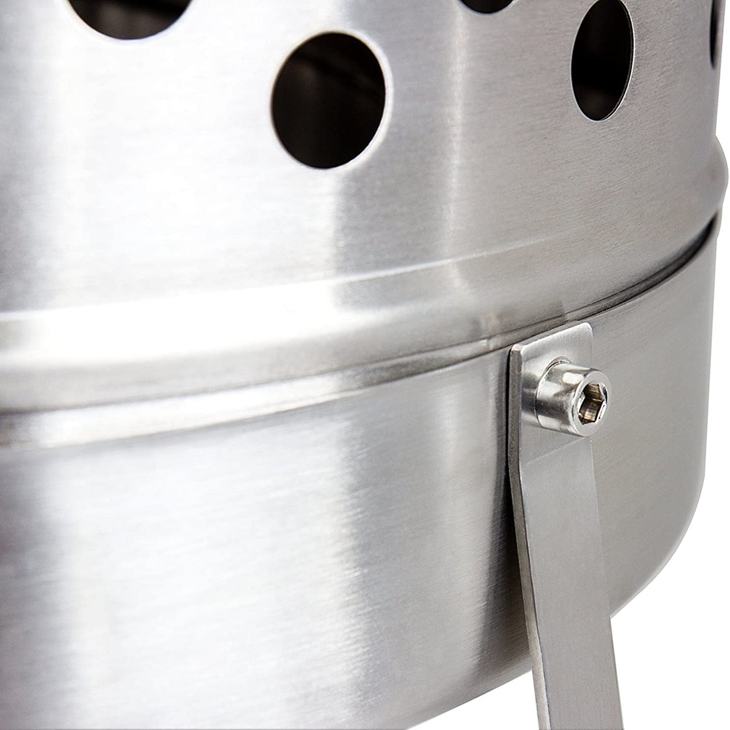 Close-up of brushed stainless steel fire barrel with round ventilation holes and sturdy handle attachment, designed for outdoor use in Farm, Garden & Tool, Camping, and Best Sellers collections.