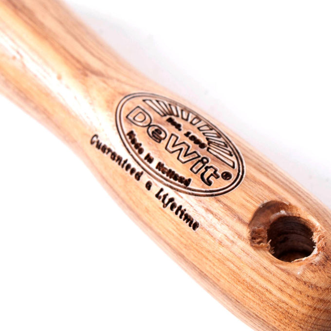 Close-up of the smooth wooden handle of a handcrafted weeding tool, featuring a stamped logo and a durable hole for hanging, ideal for Farm, Garden & Tool and Digging and Cultivating collections.