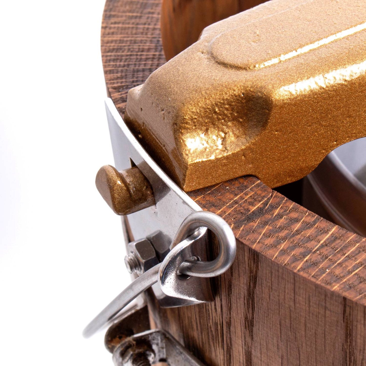 Close-up of a handcrafted Amish made wooden ice cream freezer latch and metal clamp with textured cast iron parts, highlighting rugged design for Kitchen & Food and Specialty Equipment collections.