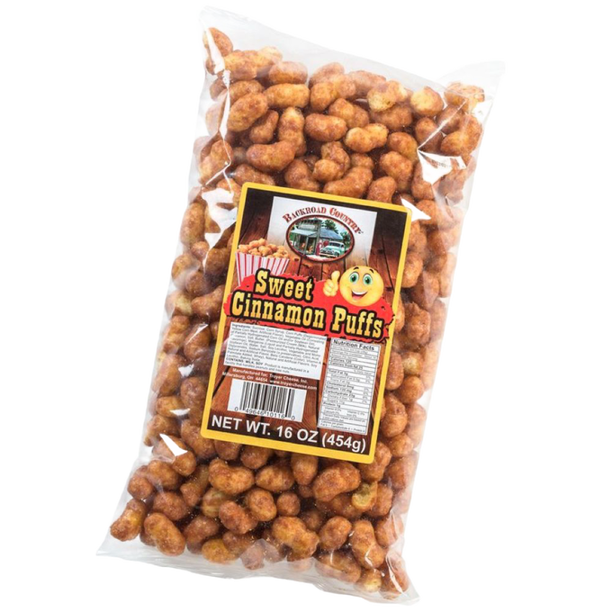 Clear plastic package of handcrafted sweet cinnamon puffs weighing 16 ounces, made in USA, featured in Kitchen & Food, Snacks and Sweets, USA Made, Best Sellers, and Promo Eligible collections.