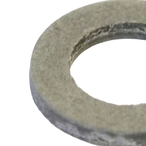 Close-up of a round metal washer or bushing with a textured surface, designed to reduce friction in kitchen and food specialty equipment, including butchering supplies in best sellers and promo collections.