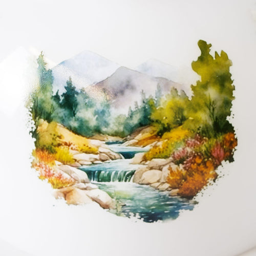 Handcrafted glass lamp shade featuring a detailed painted scene of a wild mountain stream with flowing water, rocks, and colorful trees, perfect for Lamps & Lighting and Best Sellers collections.