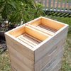 Handcrafted wooden top feeder for 8-frame hives with two compartments and wooden floats, Amish made in the USA, ideal for beekeeping and farm, garden, and tool collections.