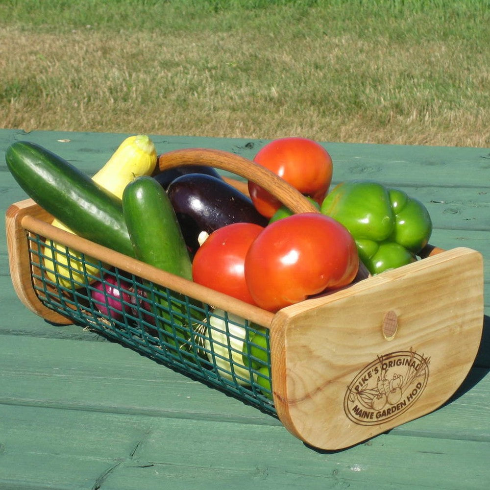 Handcrafted wooden and wire mesh garden hod with engraved logo, holding fresh vegetables including tomatoes, cucumbers, eggplant, and peppers, part of Farm, Garden & Tool, USA Made, and Best Sellers collections.