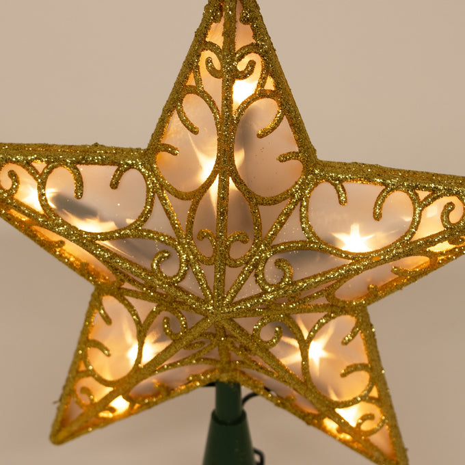 Golden glittered lighted star tree topper with intricate scroll pattern and warm glow, perfect for adding elegance to holiday decor in Home & Decor, Best Sellers, and Promo Eligible collections.