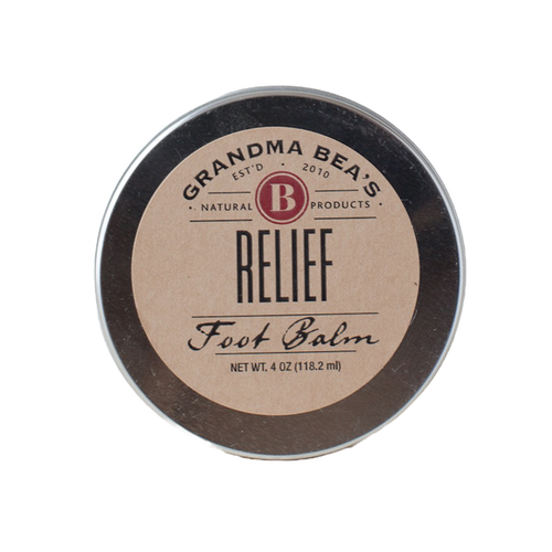 Round metal tin of handcrafted relief balm for soothing tired feet, featuring a simple natural label, made in USA and part of Health & Wellness and Balms, Creams and Lotions collections.