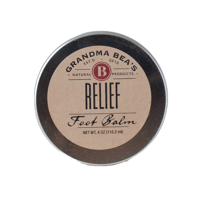 Round metal tin of handcrafted relief balm for soothing tired feet, featuring a simple natural label, made in USA and part of Health & Wellness and Balms, Creams and Lotions collections.