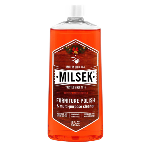 Clear plastic bottle of orange-hued wood furniture polish and multi-purpose cleaner with white cap and vintage-style label, ideal for Home & Decor, Household Cleaning, and USA Made collections.