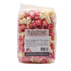 Clear bag of handcrafted popcorn in vibrant white and deep raspberry colors, featuring a sweet and savory black raspberry cheesecake flavor, Amish-made in USA, ideal for Kitchen & Food, Snacks and Sweets, Popcorn, USA Made, Best Sellers, and Promo Eligible collections.