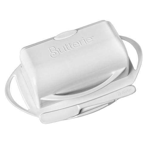 Creamy white flip-top butter dish with matching spreader resting on a tray, designed for easy, mess-free butter storage and spreading in Kitchen & Food and Kitchen Gadgets collections.