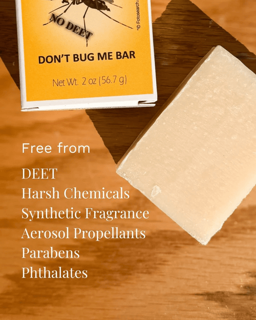 Natural bug-repelling soap bar and packaging highlighting its free-from DEET, harsh chemicals, synthetic fragrances, aerosol propellants, parabens, and phthalates qualities, ideal for Health & Wellness collections.