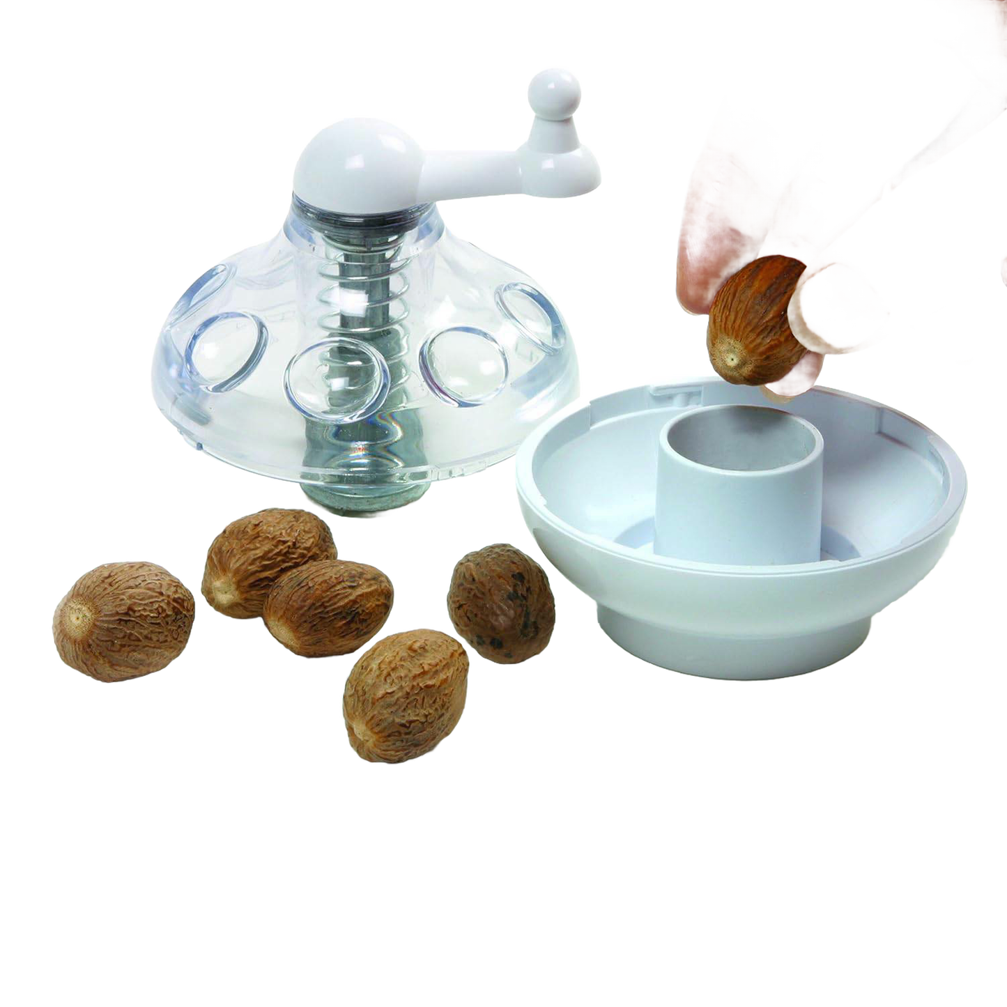 Transparent spice grinder with a white crank handle and stainless steel blades, designed for safely grinding nuts and hard spices, ideal for Kitchen & Food, Brewing Coffee and Tea, and Best Sellers collections.