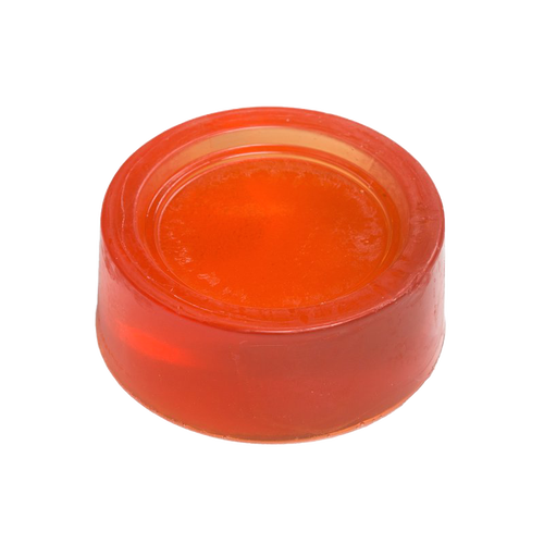 Amber-colored translucent shaving soap puck with smooth surface, featured in Health & Wellness, Grooming and Personal Hygiene, Soaps and Soapmaking, USA Made, Best Sellers, and Promo Eligible collections.