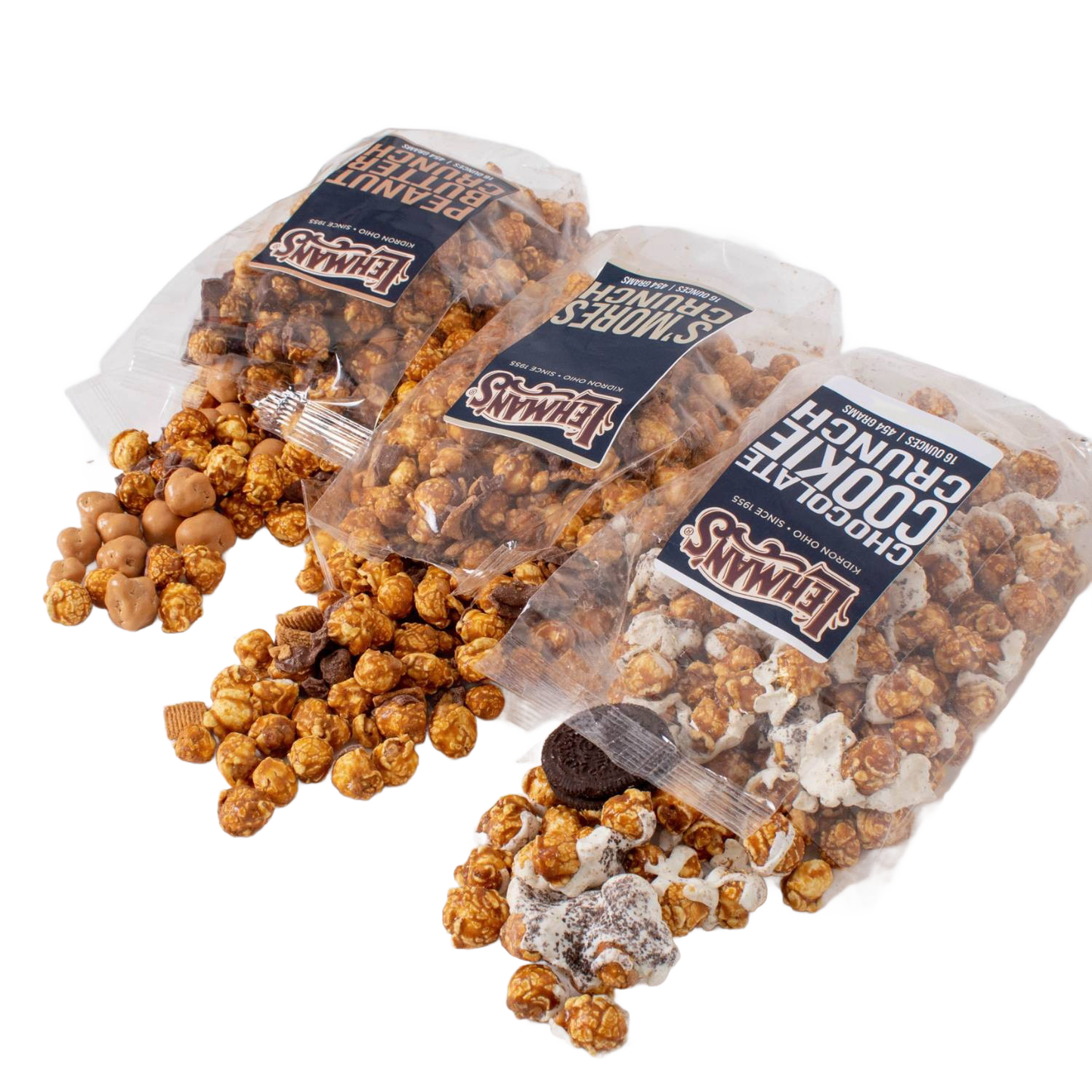 Three clear bags of handcrafted caramel popcorn crunch in different flavors with mix-ins like cookies and peanut butter bites, a unique snack made in USA, perfect for Kitchen & Food, Snacks and Sweets, Popcorn, USA Made, and Best Sellers collections.
