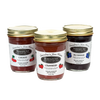 Three handcrafted glass jars of no sugar added homestyle jam in cherry, strawberry, and blueberry flavors, made in USA and featured in Kitchen & Food, Food, Peanut Butter & Jellies, USA Made, Best Sellers, and Promo Eligible collections.