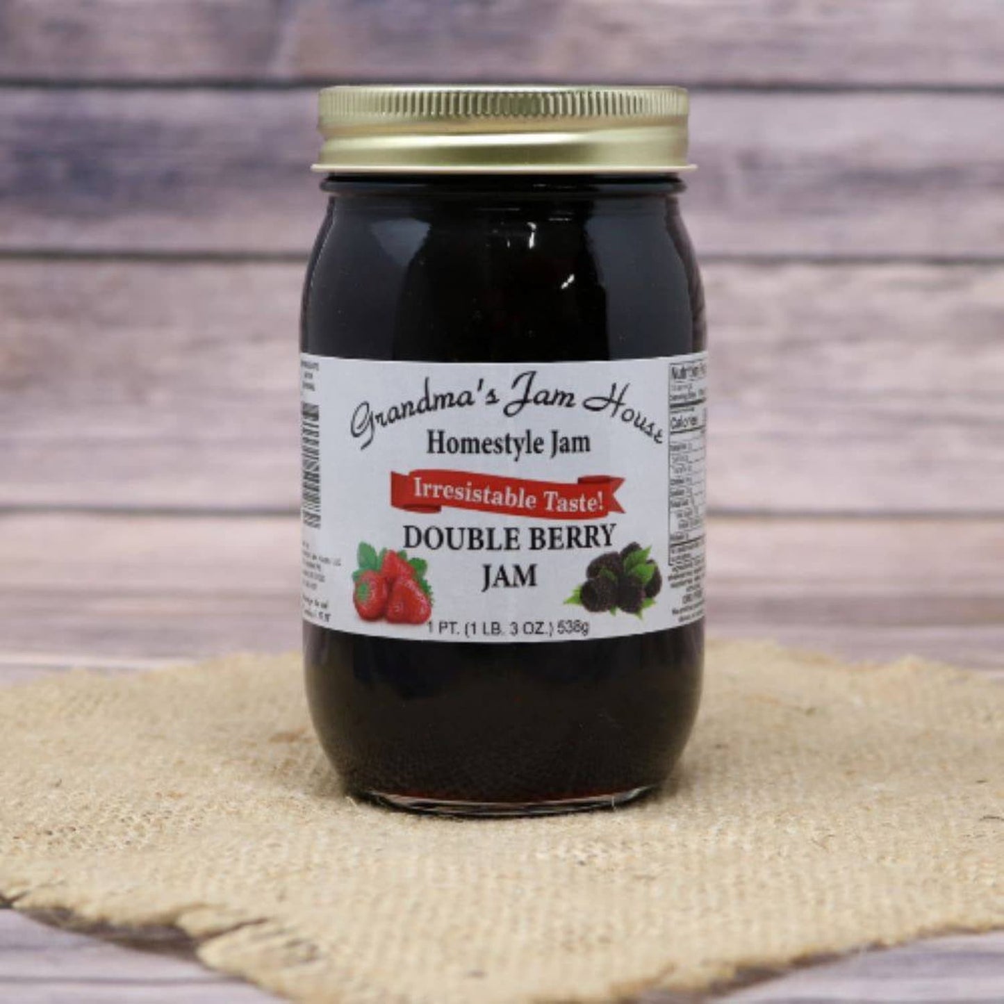 Handcrafted jar of double berry homestyle jam with gold lid and white label featuring strawberry and blackberry illustrations, made in USA, perfect for Kitchen & Food, Pantry, Peanut Butter & Jellies, Best Sellers, and Promo Eligible collections.