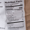 Close-up of nutrition facts label on a 50 lb bag of Hard Red Winter Wheat showing calories, fat, carbohydrates, protein content, and minerals, featured in Pantry, Food, and USA Made collections.