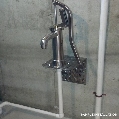Handcrafted stainless steel shallow well pump mounted on a concrete wall, featuring a rust-resistant lever and spout, ideal for Appliances and Water Pumps collections, made in USA.