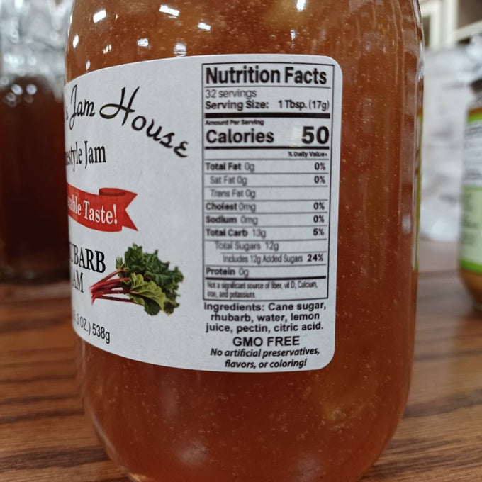 Close-up of handcrafted rhubarb jam jar label showing nutritional facts and simple ingredients, made in USA, featured in Kitchen & Food, Pantry, Peanut Butter & Jellies, USA Made, Best Sellers, and Promo Eligible collections.