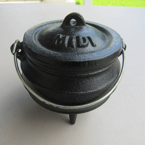 Small cast iron pot with three built-in legs and a metal handle, pre-seasoned with flaxseed oil, ideal for outdoor dining and cooking, featured in Kitchen & Food, Cookware, Cast Iron, and Best Sellers collections.