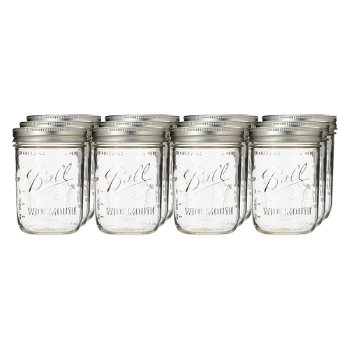 Set of 12 clear wide-mouth pint jars with metal lids, handcrafted and made in USA, perfect for food preservation, kitchen storage, canning, and crafting projects.