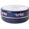 Round navy blue metal tin of handcrafted Original Rosebud Salve with vintage rose design, made in USA, perfect for Health & Wellness, Health Remedies, and Best Sellers collections.
