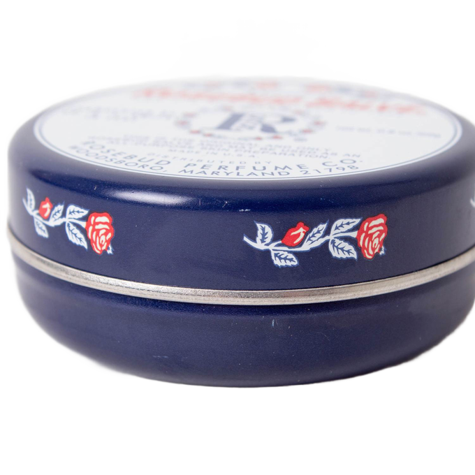 Round navy blue metal tin of handcrafted Original Rosebud Salve with vintage rose design, made in USA, perfect for Health & Wellness, Health Remedies, and Best Sellers collections.