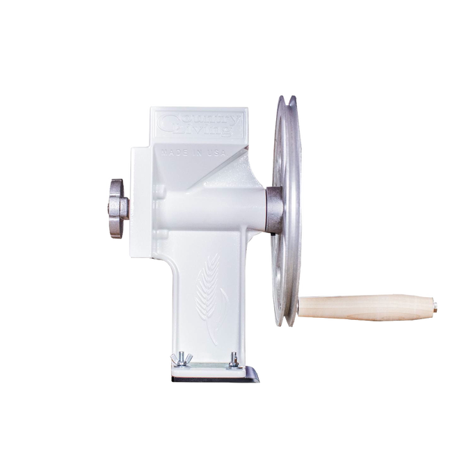 Handcrafted USA made grain mill with a sturdy aircraft aluminum flywheel, machined steel burrs, and wooden handle, ideal for farm, garden, kitchen, and emergency supplies.
