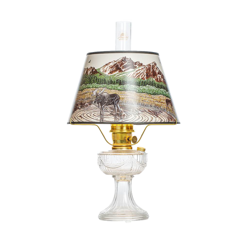 Aladdin Lincoln drape oil lamp featuring a clear USA-made glass font, brass burner, and a Rocky Mountain scenic parchment shade, perfect for Lamps & Lighting, Oil Lamps, Table Lamps, Best Sellers, and Promo Eligible collections.