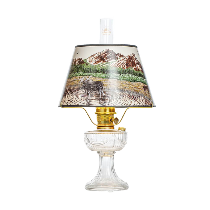 Aladdin Lincoln drape oil lamp featuring a clear USA-made glass font, brass burner, and a Rocky Mountain scenic parchment shade, perfect for Lamps & Lighting, Oil Lamps, Table Lamps, Best Sellers, and Promo Eligible collections.