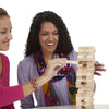 Two women playing a classic wooden block stacking game on a white table, showcasing family-friendly strategy and skill in Toys, Books & Games, Children's Toys, and Table and Board Games collections.