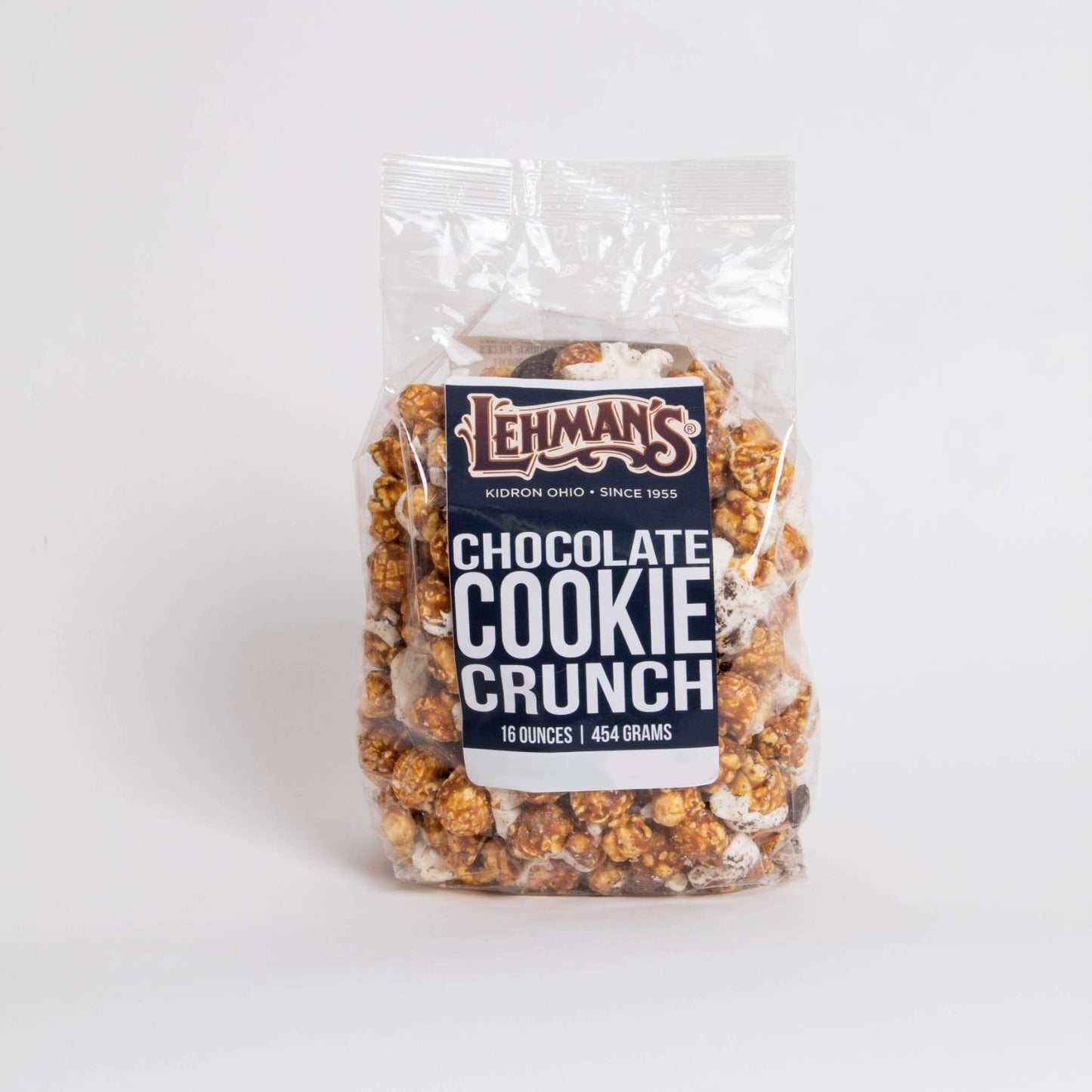 Clear bag of handmade caramel popcorn mixed with chocolate cookie crunch pieces, a unique sweet and crunchy treat made in USA, ideal for Kitchen & Food, Snacks and Sweets, Popcorn, USA Made, Best Sellers, and Promo Eligible collections.