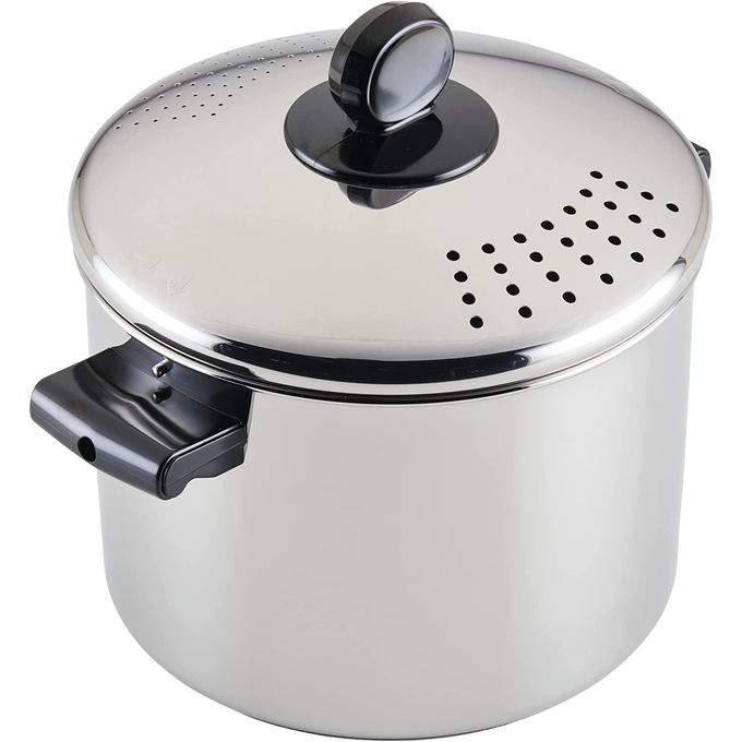 Polished stainless steel stockpot with an integrated colander lid featuring perforated holes for easy straining, designed for kitchen use and included in Cookware and Best Sellers collections.