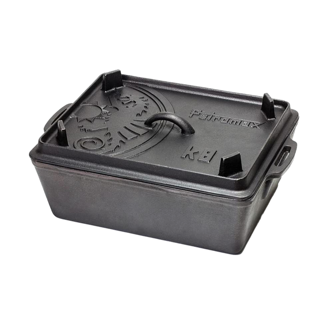 Durable cast iron loaf pan with fitted lid featuring embossed design, ideal for baking bread, casseroles, and outdoor cooking, perfect for kitchen, camping, and cookware collections.