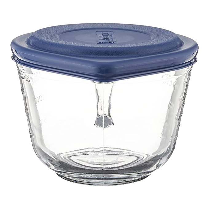 Clear heavy glass batter bowl with embossed measurement marks, sturdy handle, and blue lid, designed for Kitchen & Food, Cookware, Baking Supplies, Storage and Serving, USA Made collections.