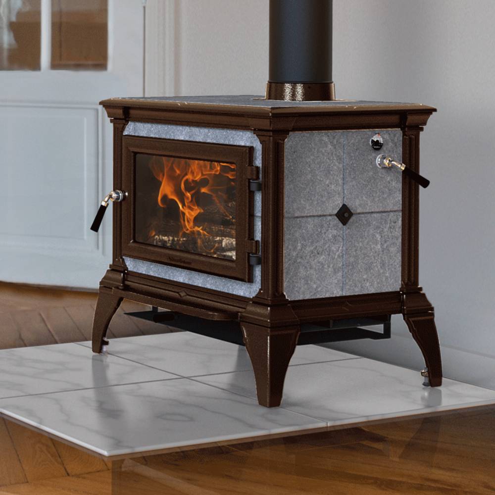 Traditional style Hearthstone Castleton 1 wood heat stove with cast iron frame and stone panels, burning warmly on a polished marble hearth indoors, ideal for Stoves and Best Sellers collections.
