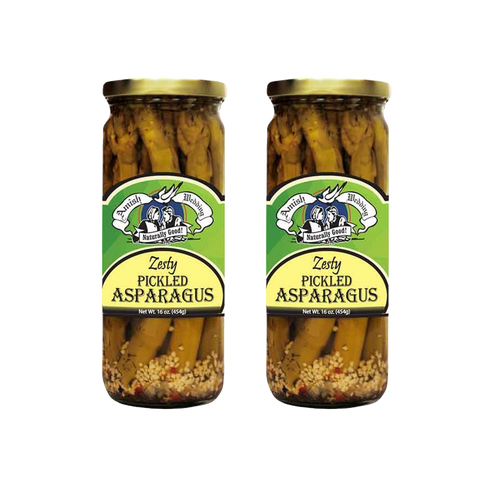 Two glass jars of handcrafted pickled asparagus spears with zesty seasoning, made in the USA, ideal for Kitchen & Food, Pantry, and Best Sellers collections.