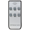 Compact LED remote control with six buttons including power, brightness adjustment, and timer functions, designed for use with LED clip-on candle lights in Home & Decor, Holiday Decor, Best Sellers, and Promo Eligible collections.