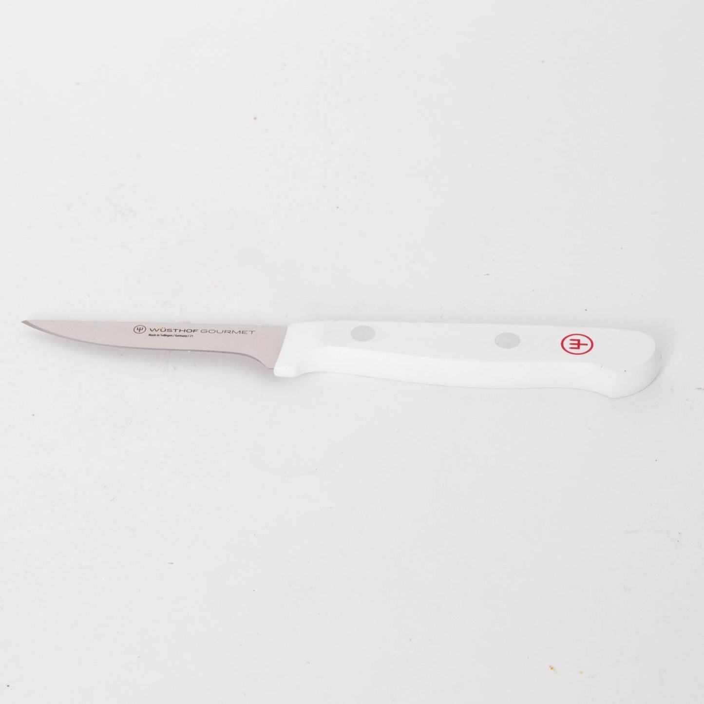 Kitchen paring knife with stainless steel blade and smooth white handle featuring rivet accents, crafted for precise food prep in Kitchen & Food, Knives & Axes, and Food Prep collections.