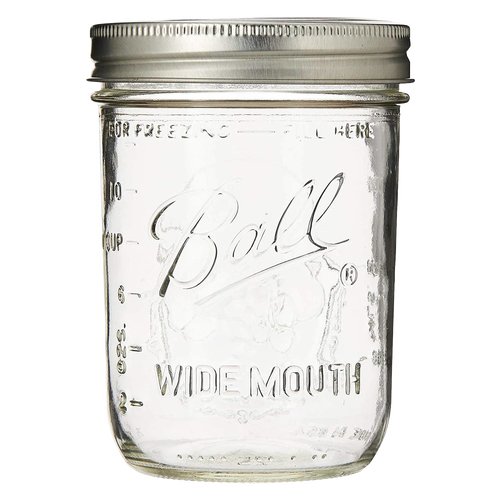 Clear glass wide-mouth pint jar with metal screw-on lid, handcrafted in the USA for use in Kitchen & Food, Food Preservation, Canning, and Canning Jars and Accessories collections.