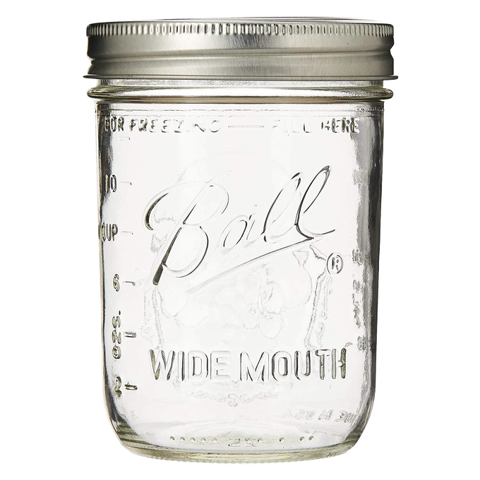 Clear glass wide-mouth pint jar with metal screw-on lid, handcrafted in the USA for use in Kitchen & Food, Food Preservation, Canning, and Canning Jars and Accessories collections.