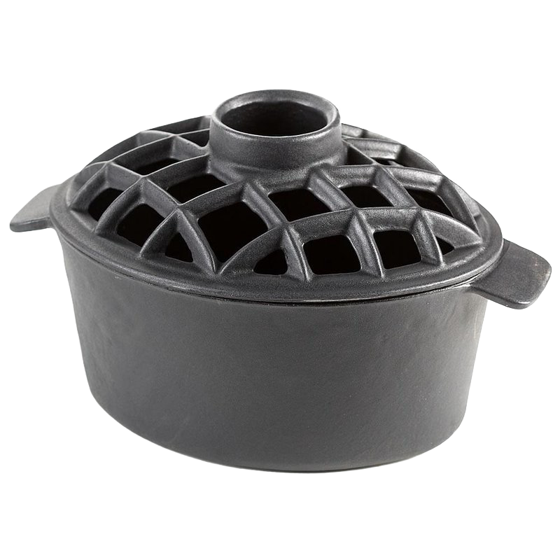 Heavy-duty flat black cast iron stovetop steamer with a lattice lid designed for use on wood stoves, adding moisture naturally, featured in Stoves and Hearth Accessories collections.