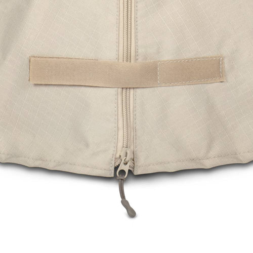 Close-up of a beige ripstop fabric cover with a full-length zipper and an exterior fastening strap, designed for quick and secure use, part of Farm, Garden & Tool, Camping, Best Sellers, and Promo Eligible collections.