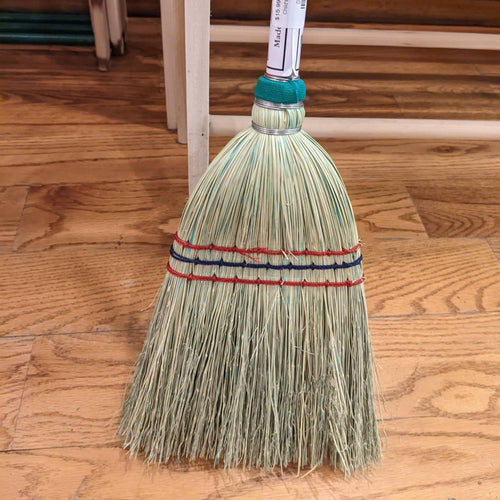 Handcrafted small corn straw broom with tightly bound bristles accented by red and blue threads, made in USA and Amish made, featured in Home & Decor, Children's Toys, and Cleaning Utensils collections.